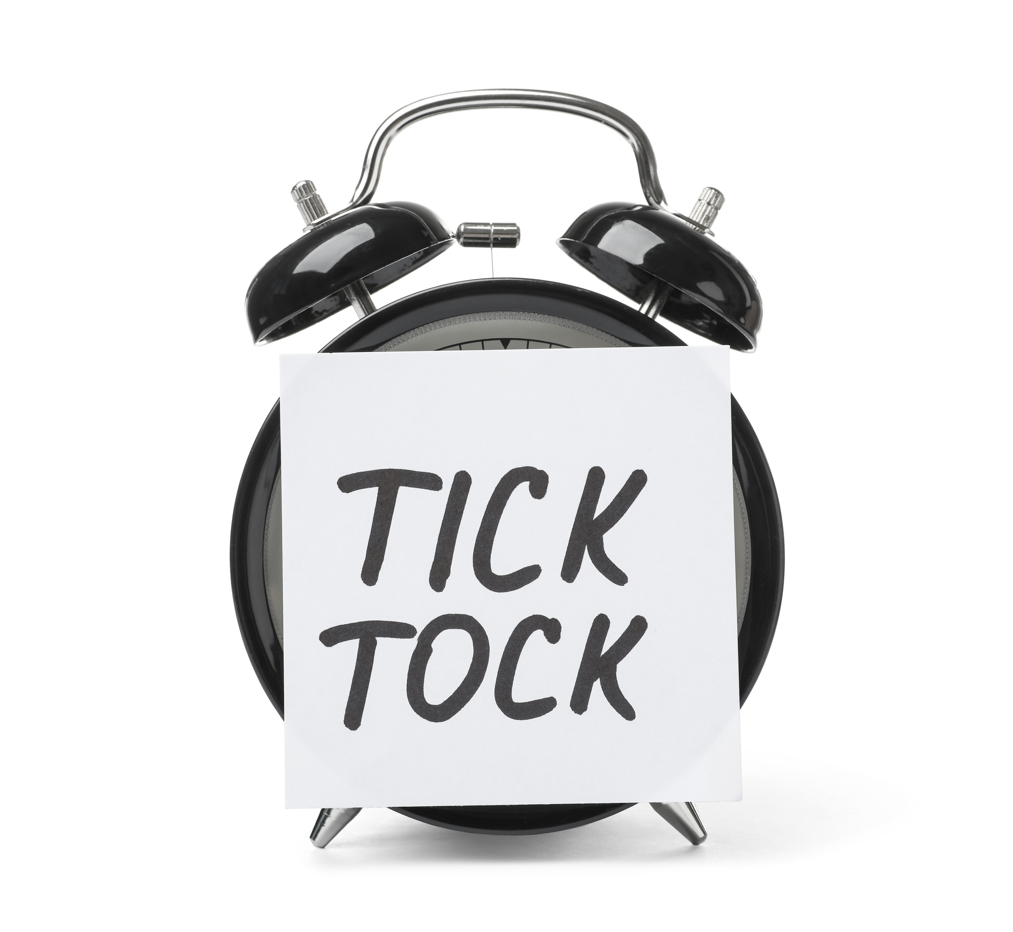 Alarm clock and sticky note with words TICK TOCK on white background. Time concept